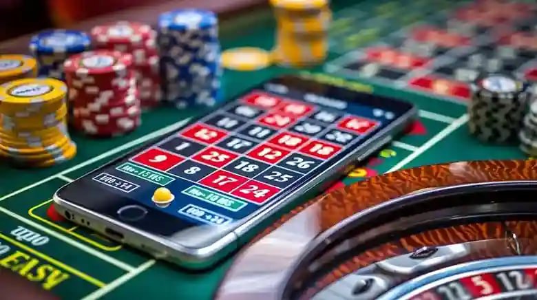 Detail papan taruhan French Roulette dengan label bahasa Indonesia dan bola roulette